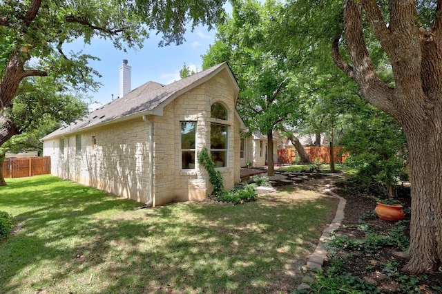 15901 Double Eagle Dr, Austin, TX 78717 - view of property exterior featuring stone siding, a chimney, and a shingled roof