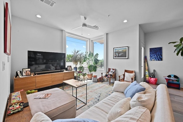 1800 E 4th St Unit 335, Austin, TX 78702 - living area featuring wood finished floors, recessed lighting, and a ceiling fan