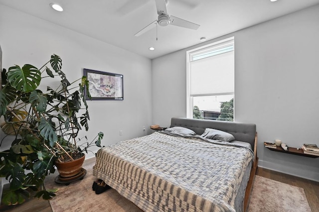1800 E 4th St Unit 335, Austin, TX 78702 - bedroom featuring wood finished floors, recessed lighting, and a ceiling fan