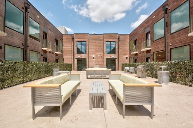 1800 E 4th St Unit 335, Austin, TX 78702 - view of patio / terrace featuring an outdoor living space and grilling area