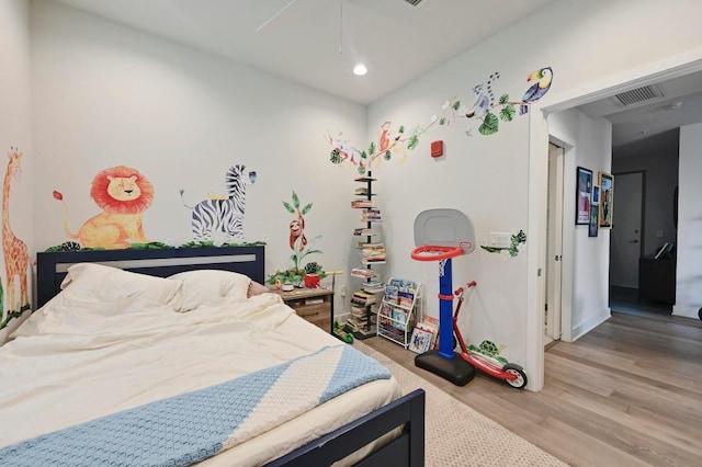 1800 E 4th St Unit 335, Austin, TX 78702 - bedroom featuring light wood-style floors, recessed lighting, baseboards, and a ceiling fan