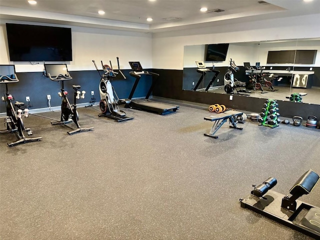 1800 E 4th St Unit 335, Austin, TX 78702 - exercise room with recessed lighting, a raised ceiling, and baseboards