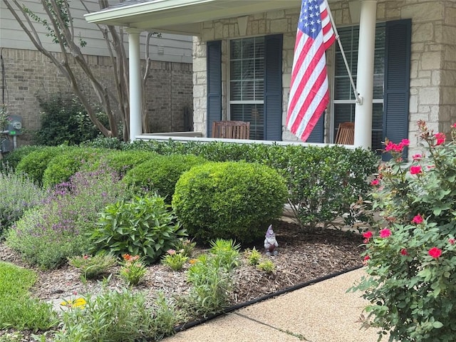 2619 Henley Dr, Round Rock, TX 78681 - view of property exterior featuring covered porch and brick siding