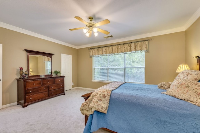 2619 Henley Dr, Round Rock, TX 78681 - bedroom with light carpet, ornamental molding, and ceiling fan
