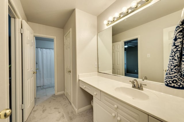 2619 Henley Dr, Round Rock, TX 78681 - full bathroom featuring vanity and baseboards