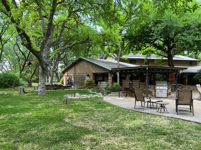 TBD County Road 246, Florence, TX 76527 - view of green lawn featuring a patio area and exterior kitchen