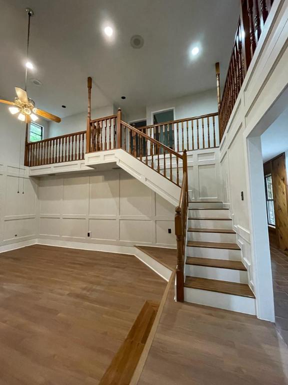 TBD County Road 246, Florence, TX 76527 - stairway with a decorative wall, ceiling fan, wood finished floors, and recessed lighting