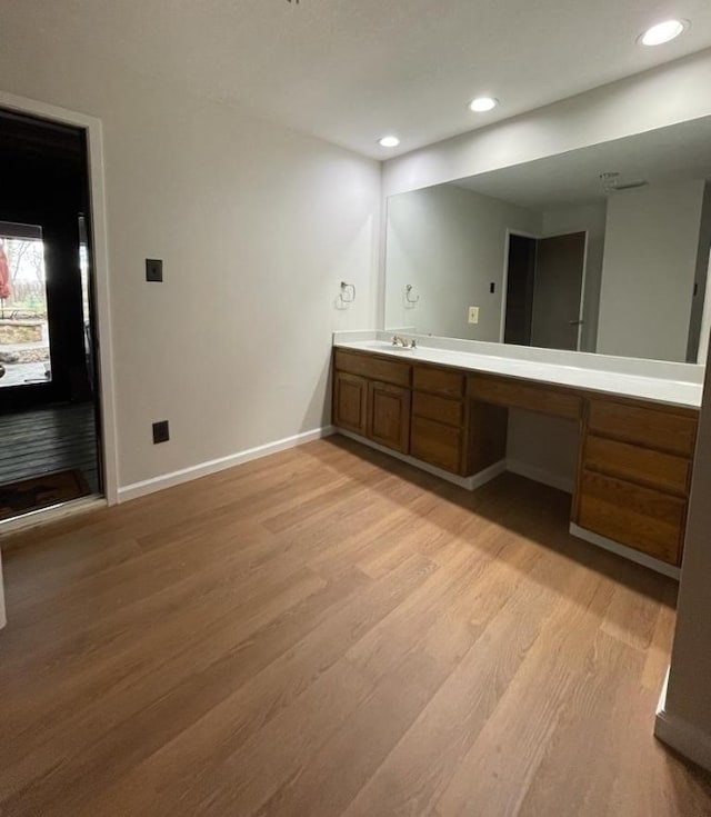 TBD County Road 246, Florence, TX 76527 - bathroom featuring wood finished floors, baseboards, recessed lighting, and vanity