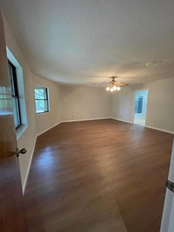 TBD County Road 246, Florence, TX 76527 - spare room with wood finished floors, ceiling fan, and baseboards