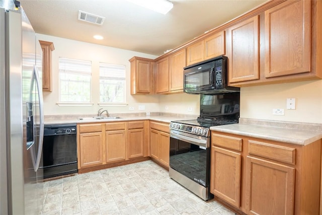 1524 Big Thicket Dr, Cedar Park, TX 78613 - kitchen featuring black appliances and light countertops