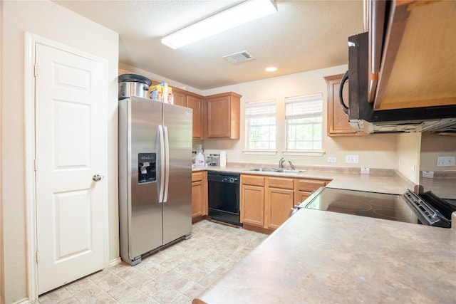 1524 Big Thicket Dr, Cedar Park, TX 78613 - kitchen featuring appliances with stainless steel finishes, light countertops, light flooring, and recessed lighting