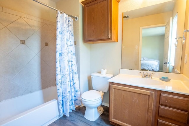 1524 Big Thicket Dr, Cedar Park, TX 78613 - ensuite bathroom featuring vanity, shower / bath combination with curtain, and wood finished floors