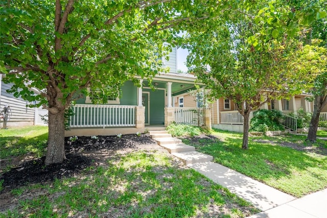 1524 Big Thicket Dr, Cedar Park, TX 78613 - view of property hidden behind natural elements with covered porch and a front lawn