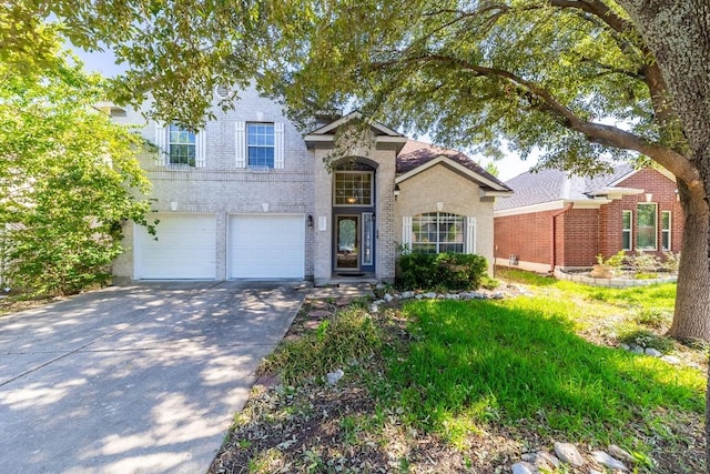 5013 Cleves St, Round Rock, TX 78681 - traditional-style home featuring brick siding, concrete driveway, and an attached garage