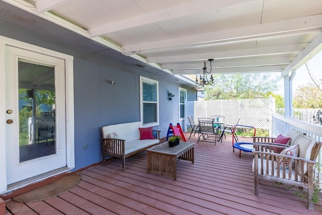 5013 Cleves St, Round Rock, TX 78681 - wooden terrace with outdoor dining area and an outdoor hangout area