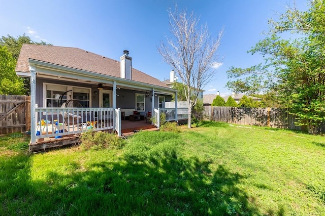 5013 Cleves St, Round Rock, TX 78681 - rear view of property featuring a fenced backyard, a chimney, ceiling fan, and a wooden deck
