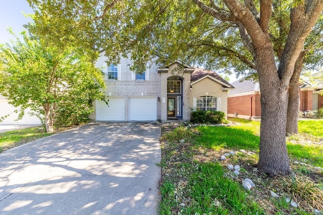 5013 Cleves St, Round Rock, TX 78681 - traditional-style house with driveway and an attached garage