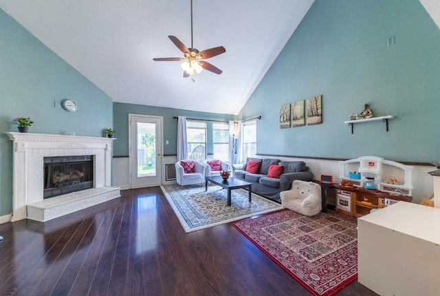 5013 Cleves St, Round Rock, TX 78681 - living room with high vaulted ceiling, wood finished floors, ceiling fan, and a fireplace