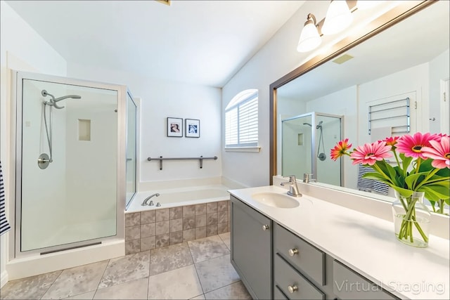 5013 Cleves St, Round Rock, TX 78681 - full bath featuring a shower stall, a garden tub, vanity, and tile patterned flooring