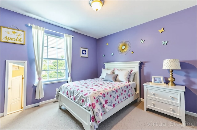 5013 Cleves St, Round Rock, TX 78681 - bedroom featuring baseboards and light carpet