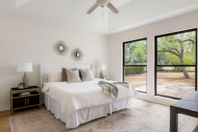 307 Malabar St, Lakeway, TX 78734 - bedroom with light wood finished floors and a ceiling fan
