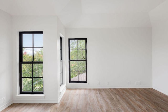 307 Malabar St, Lakeway, TX 78734 - unfurnished room with wood finished floors and baseboards