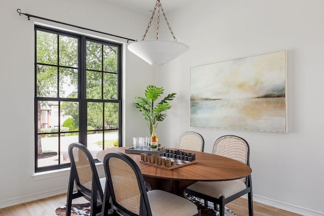 307 Malabar St, Lakeway, TX 78734 - dining room with light wood-type flooring and baseboards