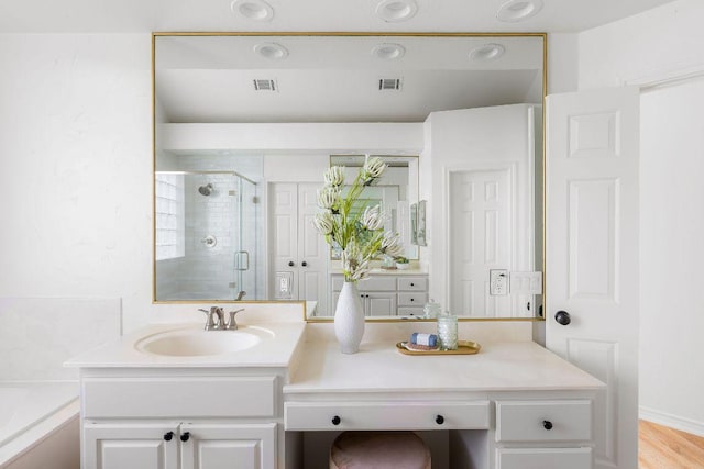 307 Malabar St, Lakeway, TX 78734 - full bath with a shower stall, vanity, and a garden tub