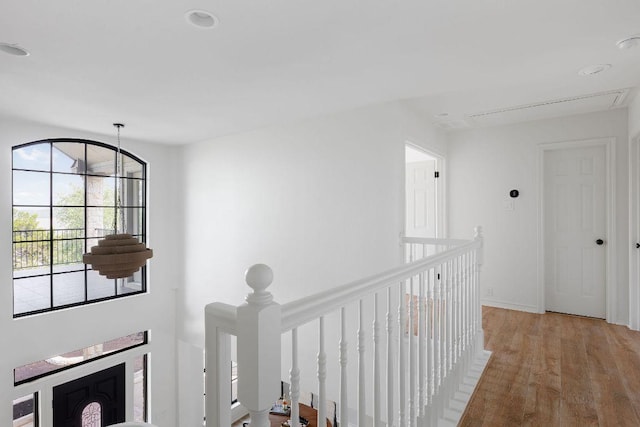 307 Malabar St, Lakeway, TX 78734 - hall with light wood-style floors, an upstairs landing, baseboards, and recessed lighting