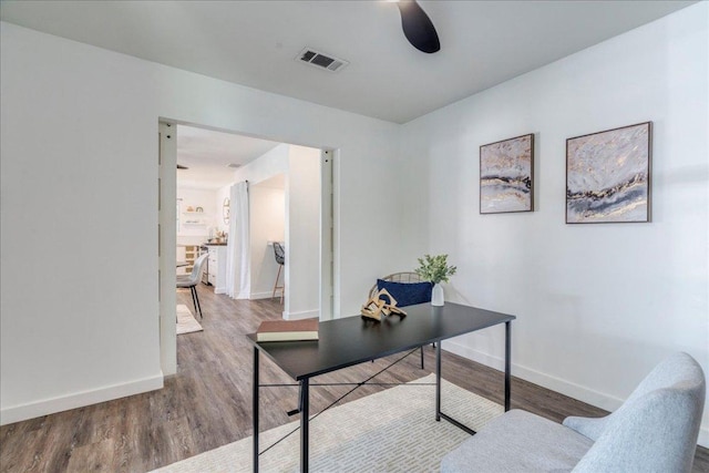 3210 Kay St, Austin, TX 78702 - office featuring a ceiling fan and wood finished floors