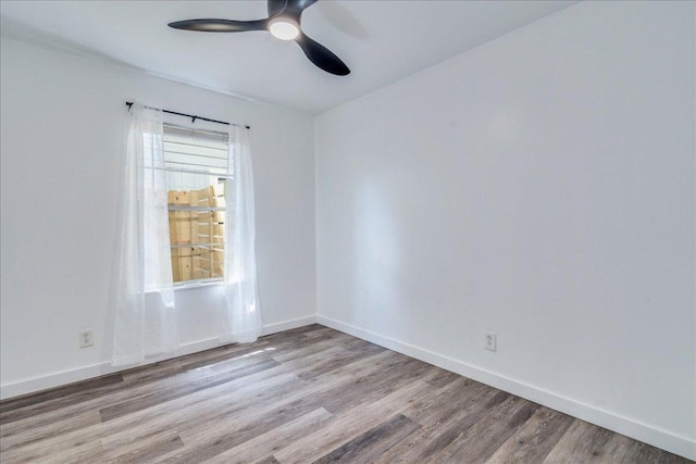 3210 Kay St, Austin, TX 78702 - spare room featuring a ceiling fan and wood finished floors