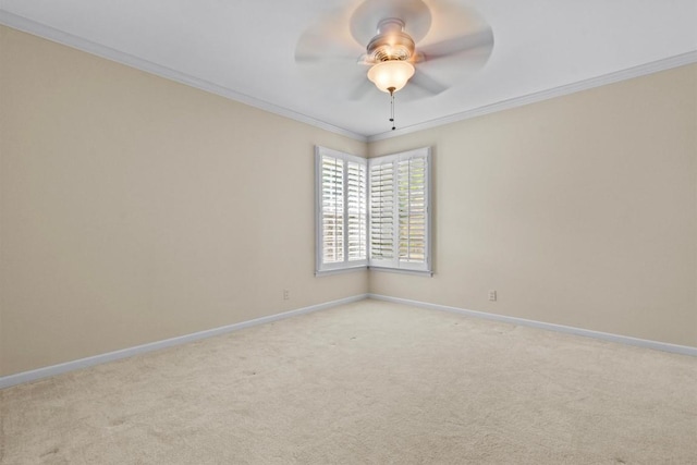 3601 Arrowhead Dr, Austin, TX 78731 - spare room with baseboards, crown molding, a ceiling fan, and light colored carpet
