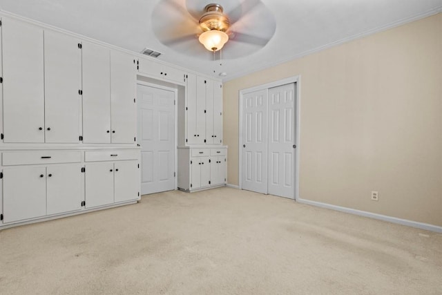 3601 Arrowhead Dr, Austin, TX 78731 - unfurnished bedroom featuring light colored carpet, baseboards, ornamental molding, and ceiling fan