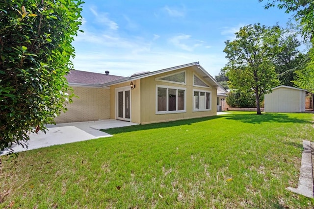 3601 Arrowhead Dr, Austin, TX 78731 - rear view of house with a patio area and a yard