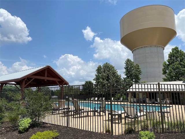 624 Purtis Creek Ln, Georgetown, TX 78628 - community pool with a patio area