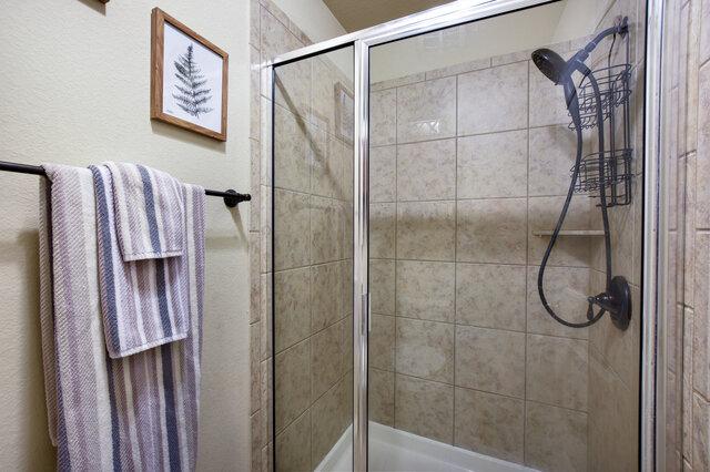 624 Purtis Creek Ln, Georgetown, TX 78628 - full bath with a stall shower
