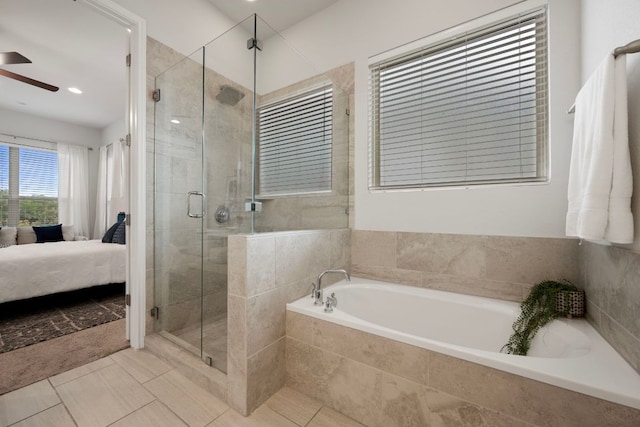 1416 Reprise Bnd, Round Rock, TX 78681 - ensuite bathroom with a garden tub, a ceiling fan, a stall shower, and tile patterned flooring