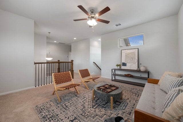 1416 Reprise Bnd, Round Rock, TX 78681 - living area featuring an upstairs landing, ceiling fan, carpet, baseboards, and recessed lighting