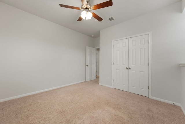 1416 Reprise Bnd, Round Rock, TX 78681 - unfurnished bedroom featuring light carpet, baseboards, a closet, and ceiling fan