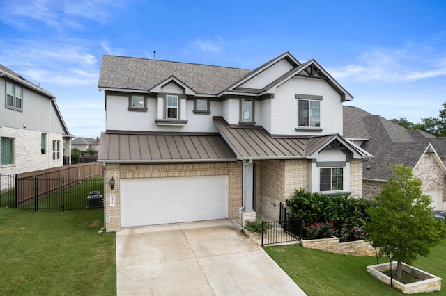1416 Reprise Bnd, Round Rock, TX 78681 - view of front facade with brick siding, roof with shingles, driveway, a standing seam roof, and an attached garage