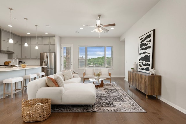 1416 Reprise Bnd, Round Rock, TX 78681 - living room featuring baseboards, a ceiling fan, dark wood-style flooring, and recessed lighting