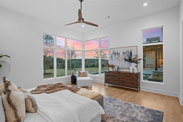 1047 Overlook Pkwy, Horseshoe Bay, TX 78657 - bedroom with recessed lighting, wood finished floors, and a ceiling fan