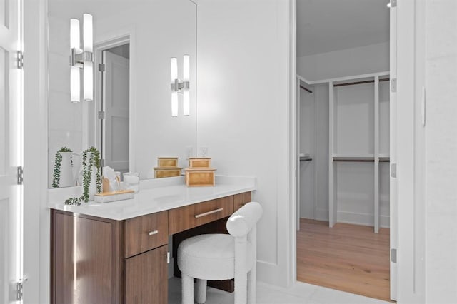 1047 Overlook Pkwy, Horseshoe Bay, TX 78657 - bathroom with wood finished floors and vanity