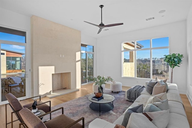 1047 Overlook Pkwy, Horseshoe Bay, TX 78657 - living room with wood finished floors and ceiling fan