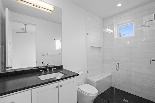 1047 Overlook Pkwy, Horseshoe Bay, TX 78657 - bathroom featuring vanity, a shower stall, tile patterned flooring, recessed lighting, and ceiling fan