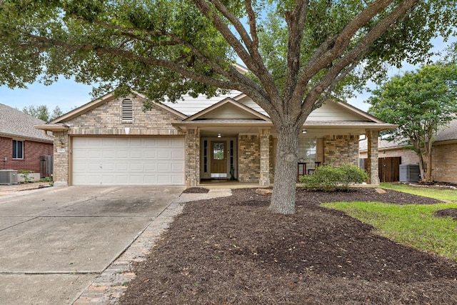 10804 N Canoa Hills Trl, Austin, TX 78717 - ranch-style house with a garage, concrete driveway, central AC, a porch, and brick siding