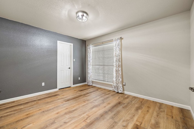 10804 N Canoa Hills Trl, Austin, TX 78717 - unfurnished room featuring wood finished floors and baseboards