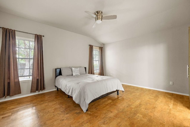 10804 N Canoa Hills Trl, Austin, TX 78717 - bedroom with lofted ceiling, multiple windows, baseboards, and ceiling fan