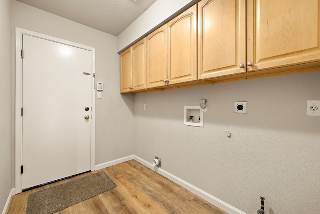 10804 N Canoa Hills Trl, Austin, TX 78717 - washroom featuring gas dryer hookup, cabinet space, hookup for an electric dryer, and baseboards