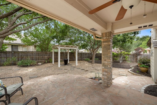 10804 N Canoa Hills Trl, Austin, TX 78717 - fenced backyard featuring a patio and a ceiling fan
